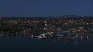 5.7K aerial stock footage a wide orbit of city's downtown area and marinas at twilight, Burlington, Vermont Aerial Stock Footage | DX0002_226_015