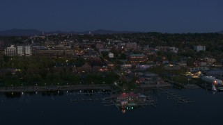 5.7K aerial stock footage of city's downtown area and a marina at twilight, Burlington, Vermont Aerial Stock Footage | DX0002_226_016