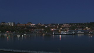 5.7K aerial stock footage fly low toward the city's downtown area and over a marina at night, Burlington, Vermont Aerial Stock Footage | DX0002_226_022