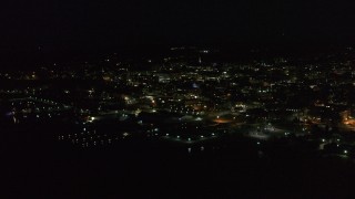 5.7K aerial stock footage of approaching downtown from the lake at nighttime, Burlington, Vermont Aerial Stock Footage | DX0002_226_045