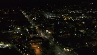 5.7K aerial stock footage fly around office buildings by Battery Street at night, Burlington, Vermont Aerial Stock Footage | DX0002_226_057