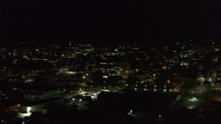 5.7K aerial stock footage ascend and orbit the downtown area at night, Burlington, Vermont Aerial Stock Footage | DX0002_226_061