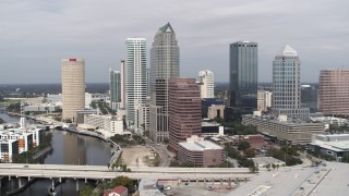 5.7K aerial stock footage of flying away from skyscrapers, Downtown Tampa, Florida Aerial Stock Footage | DX0003_229_006