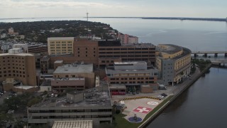 5.7K aerial stock footage reverse view of a hospital complex in Tampa, Florida Aerial Stock Footage | DX0003_229_024