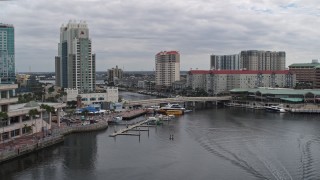 5.7K aerial stock footage approach condo complexes by a channel in Tampa, Florida Aerial Stock Footage | DX0003_229_027