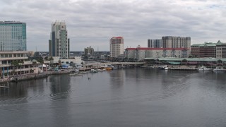 5.7K aerial stock footage a view of condo complexes by a channel in Tampa, Florida Aerial Stock Footage | DX0003_229_029