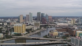 5.7K aerial stock footage of flying by the hospital while focused on skyline, Downtown Tampa, Florida Aerial Stock Footage | DX0003_229_042