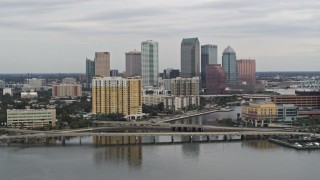 5.7K aerial stock footage of the skyline, revealing bridges and channel, Downtown Tampa, Florida Aerial Stock Footage | DX0003_230_008