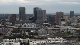 5.7K aerial stock footage of passing by the downtown skyline, Downtown Tampa, Florida Aerial Stock Footage | DX0003_230_024