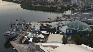 DX0003_230_029 - 5.7K aerial stock footage approach warship museum and aquarium in Tampa, Florida