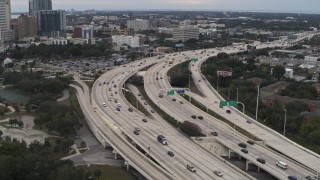 5.7K aerial stock footage flyby and away from freeway traffic in Tampa, Florida Aerial Stock Footage | DX0003_231_003