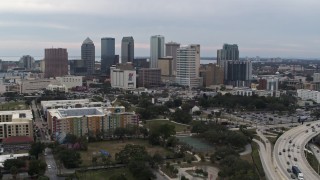 DX0003_231_005 - 5.7K aerial stock footage a wide view of flying by skyscrapers in the city's skyline, Downtown Tampa, Florida