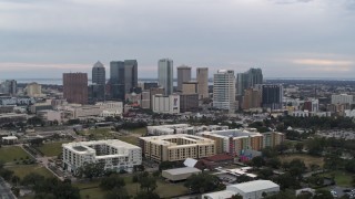 5.7K aerial stock footage orbit apartment buildings with city's skyline in background, Downtown Tampa, Florida Aerial Stock Footage | DX0003_231_009