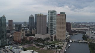 5.7K aerial stock footage of orbiting skyscrapers by the river, Downtown Tampa, Florida Aerial Stock Footage | DX0003_231_019