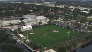 5.7K aerial stock footage ascend and orbit the Tampa Preparatory School campus, Tampa, Florida Aerial Stock Footage | DX0003_231_039