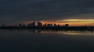 5.7K aerial stock footage fly toward Downtown Tampa skyline from the bay at sunset, Florida Aerial Stock Footage | DX0003_231_053