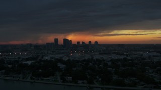 5.7K aerial stock footage slowly fly away from Downtown Tampa skyline at sunset, Florida Aerial Stock Footage | DX0003_231_055