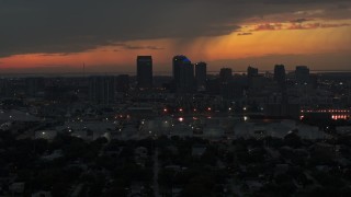 5.7K aerial stock footage of passing the Downtown Tampa skyline at twilight, Florida Aerial Stock Footage | DX0003_232_008