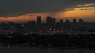 5.7K aerial stock footage flying by skyscrapers in the Downtown Tampa skyline at twilight, Florida Aerial Stock Footage | DX0003_232_014