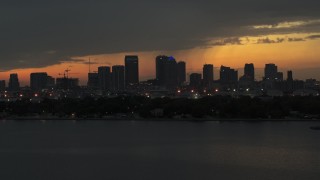 5.7K aerial stock footage passing by skyscrapers in the Downtown Tampa skyline at twilight, Florida Aerial Stock Footage | DX0003_232_015