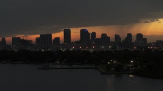 5.7K aerial stock footage of passing skyscrapers in the Downtown Tampa skyline at twilight, Florida Aerial Stock Footage | DX0003_232_019