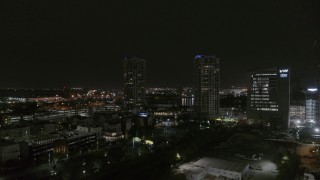 5.7K aerial stock footage of approaching office buildings at night, Downtown Tampa, Florida Aerial Stock Footage | DX0003_232_023