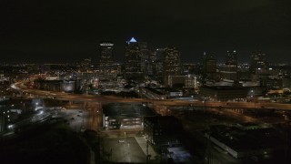 5.7K aerial stock footage fly away from and orbit skyscrapers at night in Downtown Tampa, Florida Aerial Stock Footage | DX0003_232_033