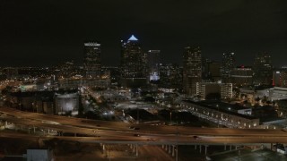 5.7K aerial stock footage of approaching skyscrapers at night in Downtown Tampa, Florida Aerial Stock Footage | DX0003_232_034