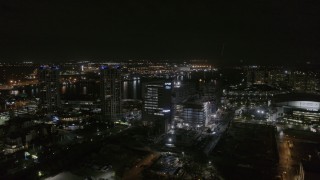 DX0003_232_037 - 5.7K aerial stock footage of orbiting medical college at nighttime in Downtown Tampa, Florida