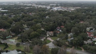 5.7K aerial stock footage of orbiting suburban homes in Orlando, Florida Aerial Stock Footage | DX0003_233_015