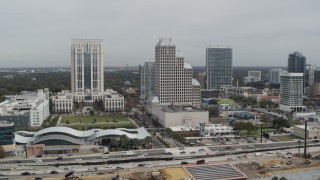 5.7K aerial stock footage slowly fly away from Bank of America Center in Downtown Orlando, Florida Aerial Stock Footage | DX0003_233_037