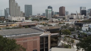 5.7K aerial stock footage descend by the Bob Carr Theater in Orlando, Florida Aerial Stock Footage | DX0003_233_038