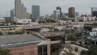 DX0003_233_041 - 5.7K aerial stock footage ascend by Bob Carr Theater for view of I-4, Orlando, Florida