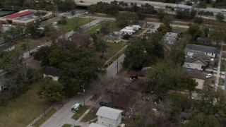 5.7K aerial stock footage of urban homes in Orlando, Florida Aerial Stock Footage | DX0003_234_014