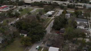 5.7K aerial stock footage of circling an urban neighborhood in Orlando, Florida Aerial Stock Footage | DX0003_234_015