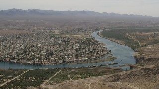 4K aerial stock footage of riverfront neighborhood on the Colorado River in Bullhead City, Arizona Aerial Stock Footage | FG0001_000023