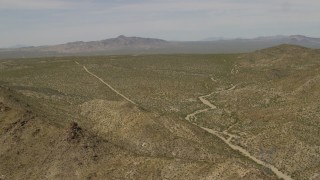 4K aerial stock footage of hills and open Mojave Desert on the border of Nevada and California Aerial Stock Footage | FG0001_000030