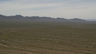 4K aerial stock footage of distant mountains and wide open Mojave Desert near Laughlin, Nevada Aerial Stock Footage | FG0001_000036