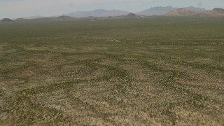 4K aerial stock footage fly over a wide Mojave Desert landscape in San Bernardino County, California Aerial Stock Footage | FG0001_000039