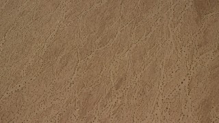 4K aerial stock footage of a bird's eye view of a flat Mojave Desert plain in San Bernardino County, California Aerial Stock Footage | FG0001_000069