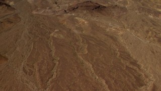 4K aerial stock footage tilt from a bird's eye view of a Mojave Desert plain to hills in San Bernardino County, California Aerial Stock Footage | FG0001_000076