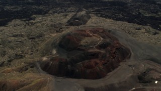 4K aerial stock footage of passing the Pisgah Crater cinder cone in the Mojave Desert, San Bernardino County, California Aerial Stock Footage | FG0001_000092