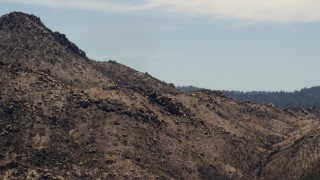 4K aerial stock footage of an arid mountain ridge in the Mojave Desert, San Bernardino County, California Aerial Stock Footage | FG0001_000125