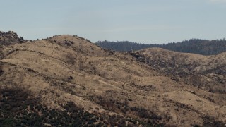 4K aerial stock footage of a mountain ridge in the Mojave Desert, San Bernardino County, California Aerial Stock Footage | FG0001_000126