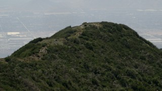 4K aerial stock footage of flying by a green mountain ridge in the San Bernardino Mountains of California Aerial Stock Footage | FG0001_000134