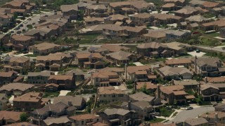 FG0001_000146 - 4K aerial stock footage of a suburban residential neighborhood in Rancho Cucamonga, California