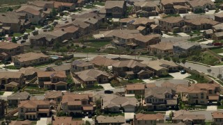 4K aerial stock footage of large homes in a suburban residential neighborhood in Rancho Cucamonga, California Aerial Stock Footage | FG0001_000147