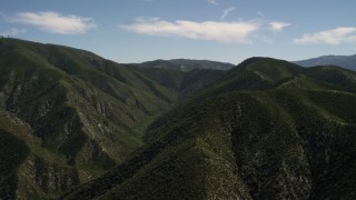 4K aerial stock footage approach a green mountain in the San Gabriel Mountains, California Aerial Stock Footage | FG0001_000162