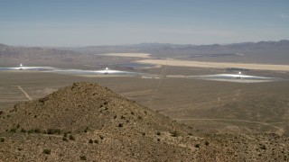 FG0001_000166 - 4K aerial stock footage of the three towers and arrays of the Ivanpah Solar Electric Generating System, California