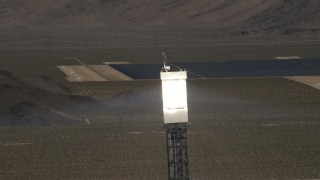 4K aerial stock footage top of a power tower at the Ivanpah Solar Electric Generating System in California Aerial Stock Footage | FG0001_000183